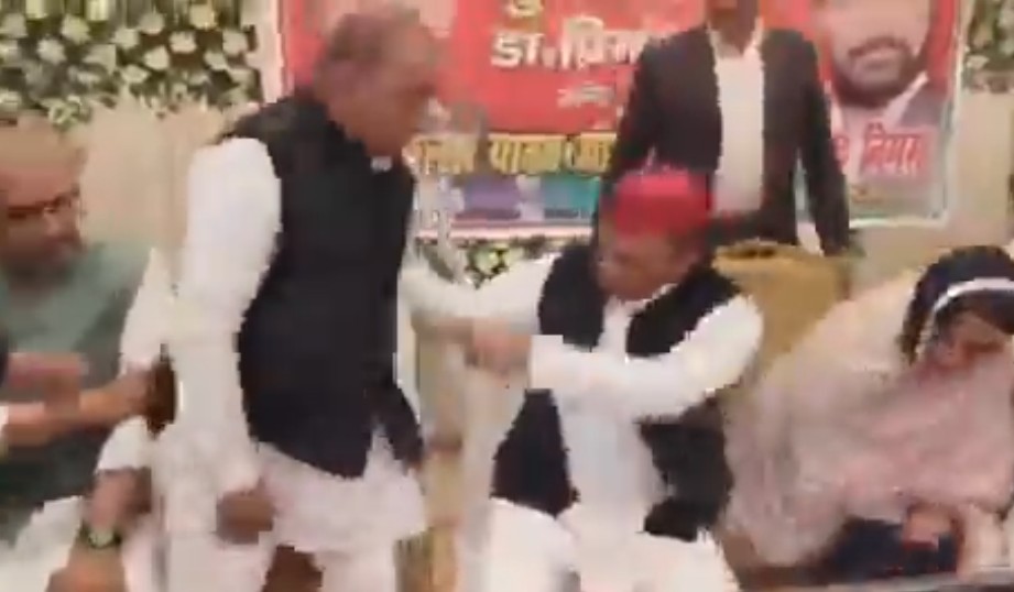 Samajwadi Party supremo Akhilesh Yadav lifted the MLA sitting on the chair next to him